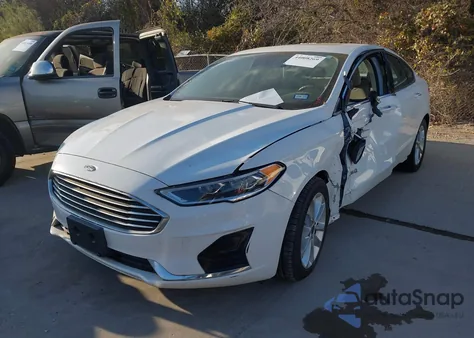 2019 Ford Fusion Hybrid Sel z USA, uszkodzony, nr VIN 3FA6P0MU5KR221251